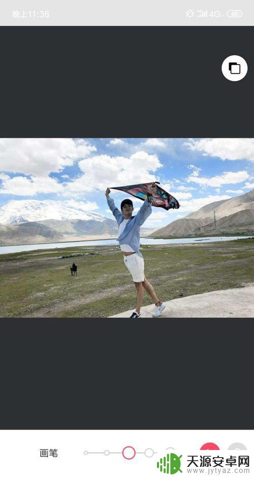 苹果手机照片后面的人怎么消除 怎么利用修图软件消除图片里的多余部分
